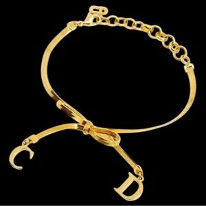 Dior Bracelet w/CD Logo (dangling from the Bow) ✨